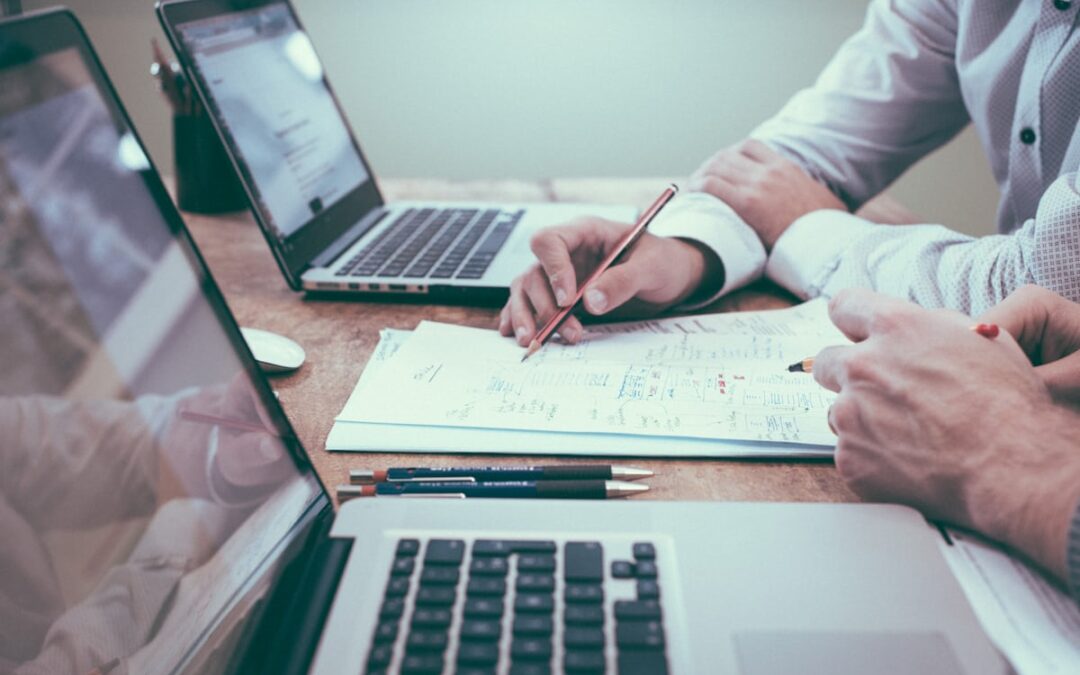 Executive boardroom reviewing cybersecurity performance metrics on quarterly dashboards