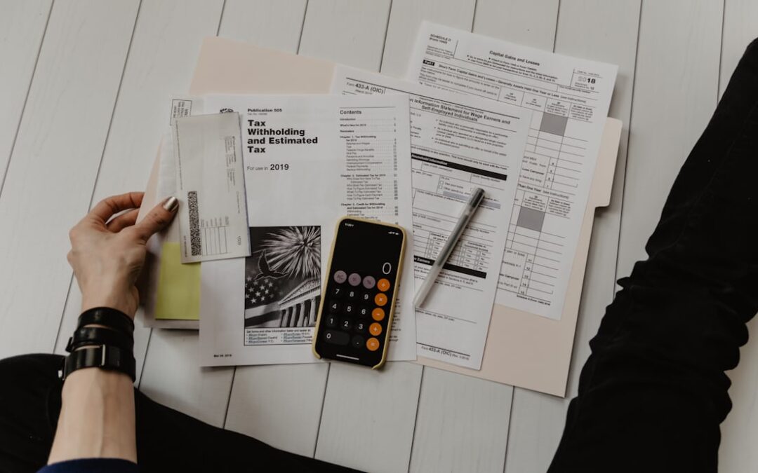 CFO reviewing cyber insurance renewal documents and underwriter checklist